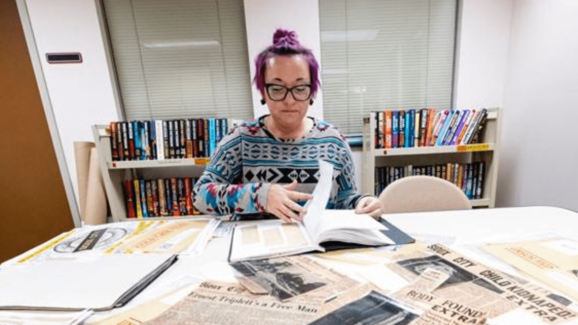 Woman sorting research materials