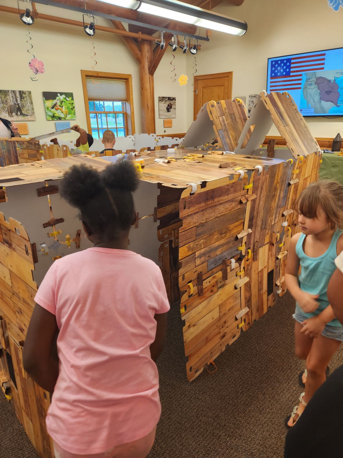 Students build a fort during Exploration Wednesdays classes in summer 2023