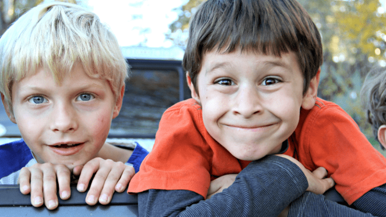 Two boys smiling